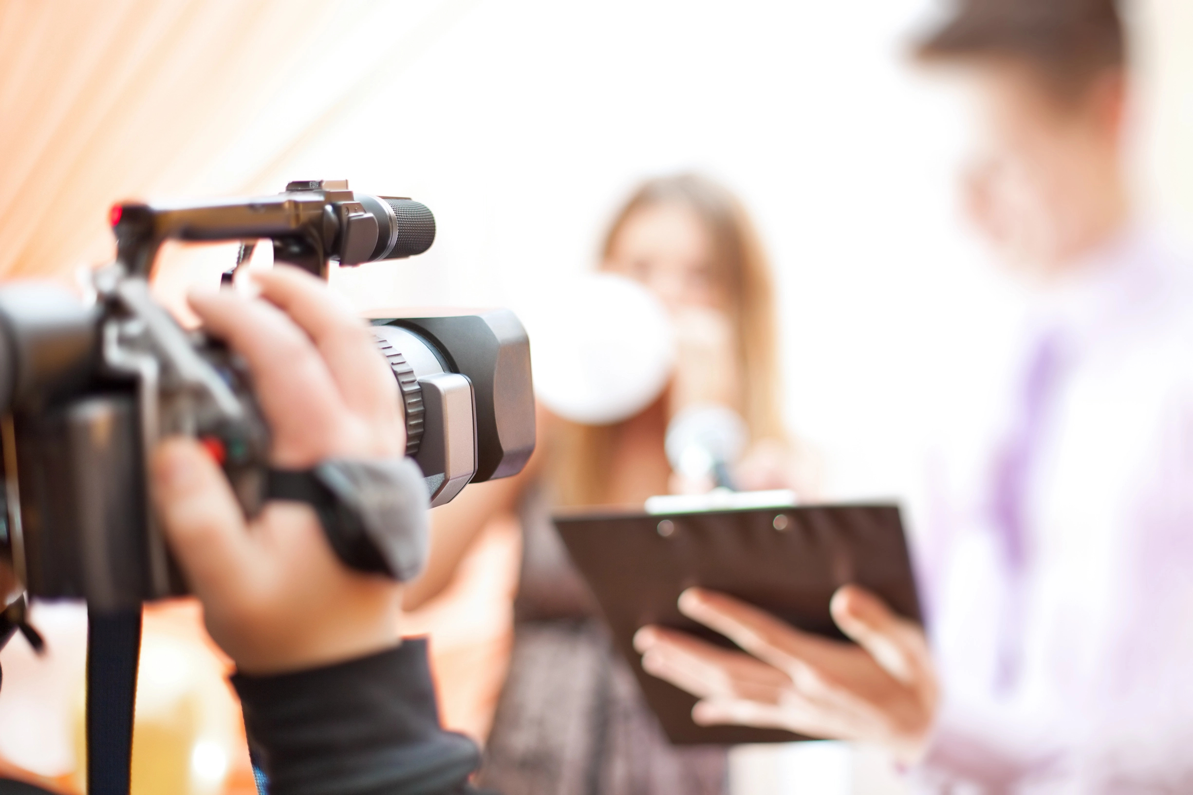 close up of video cameral from camerman angle, background blurred