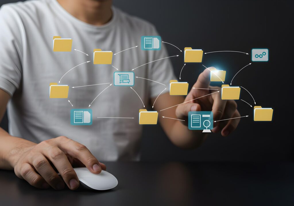 Person managing digital files and data online using a computer mouse and interacting with a network of folders and documents in a virtual workspace The concept represents efficient data management and